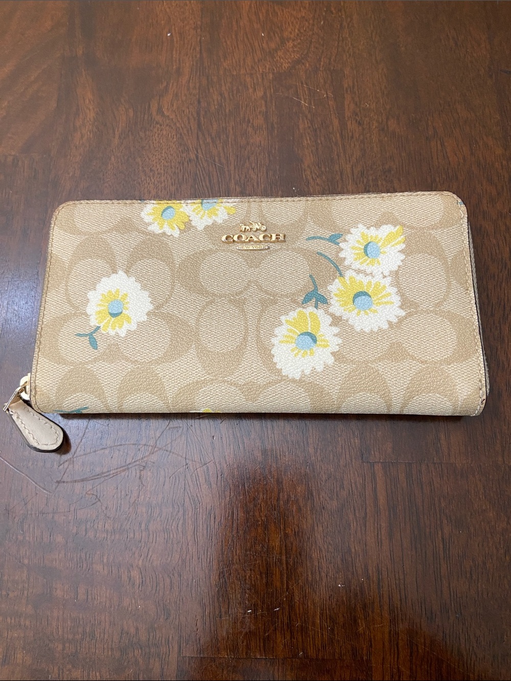 Coach Tan Daisy Zip Wallet with Blue and Yellow Accents